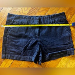 Dark wash, blue. New without tags. Mid rise 3” inseam shorts.